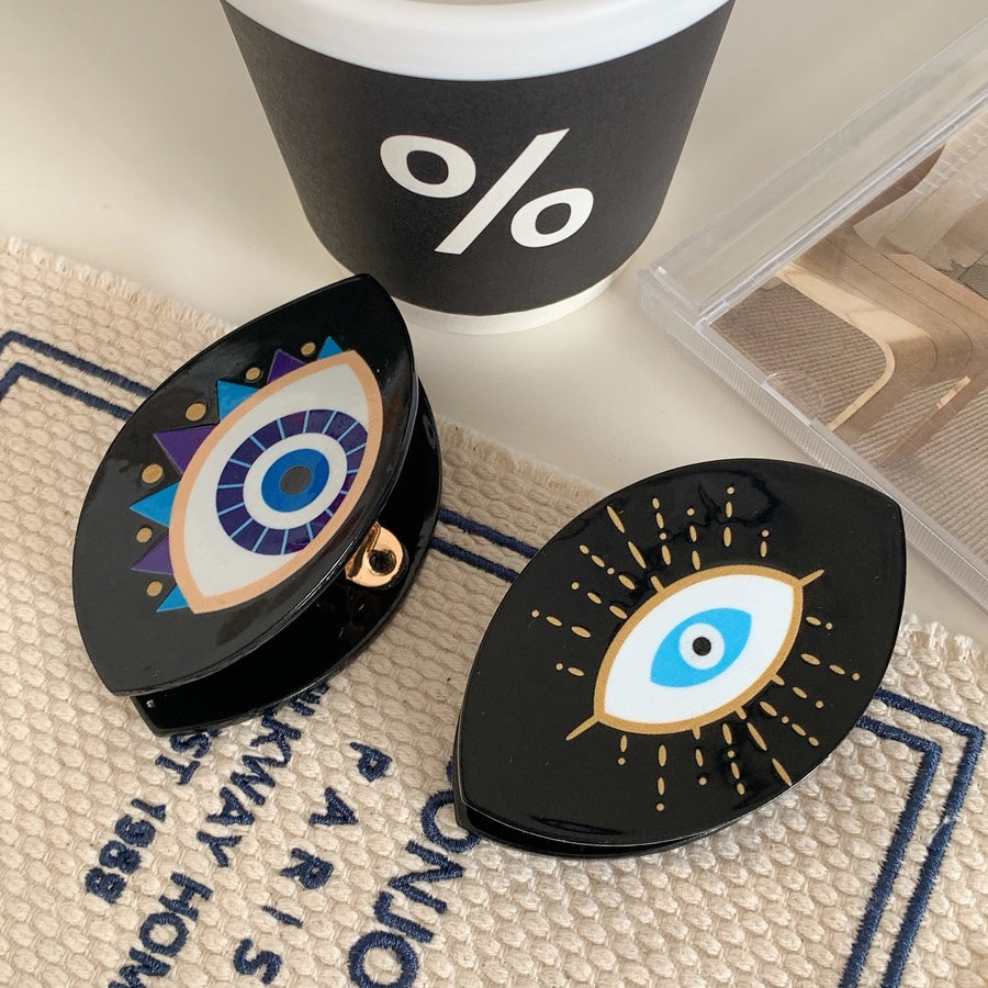 exaggerated funny devil's eye acetic acid sheets hair claws