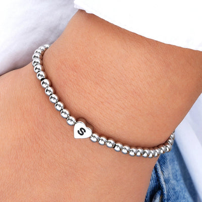 Europe and America Cross Border Hot Sale Creative 26 Letters round Beads Heart-Shaped Copper Bracelet Fashion Ins Simple Beaded Elastic Bracelet