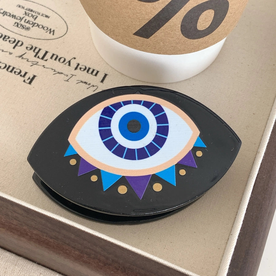 exaggerated funny devil's eye acetic acid sheets hair claws