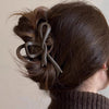 Women's Simple Style Bow Knot Arylic Hollow Out Hair Claws