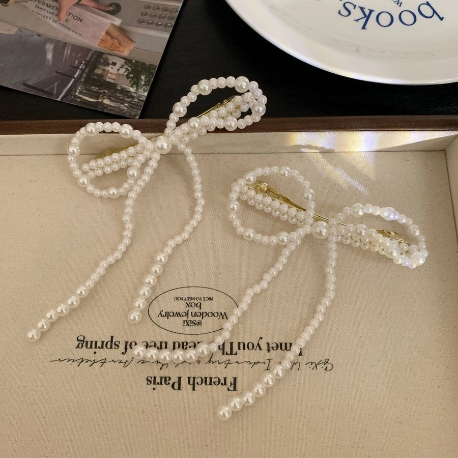 Women's Simple Style Classic Style Bow Knot Alloy Plastic Beaded Hair Clip