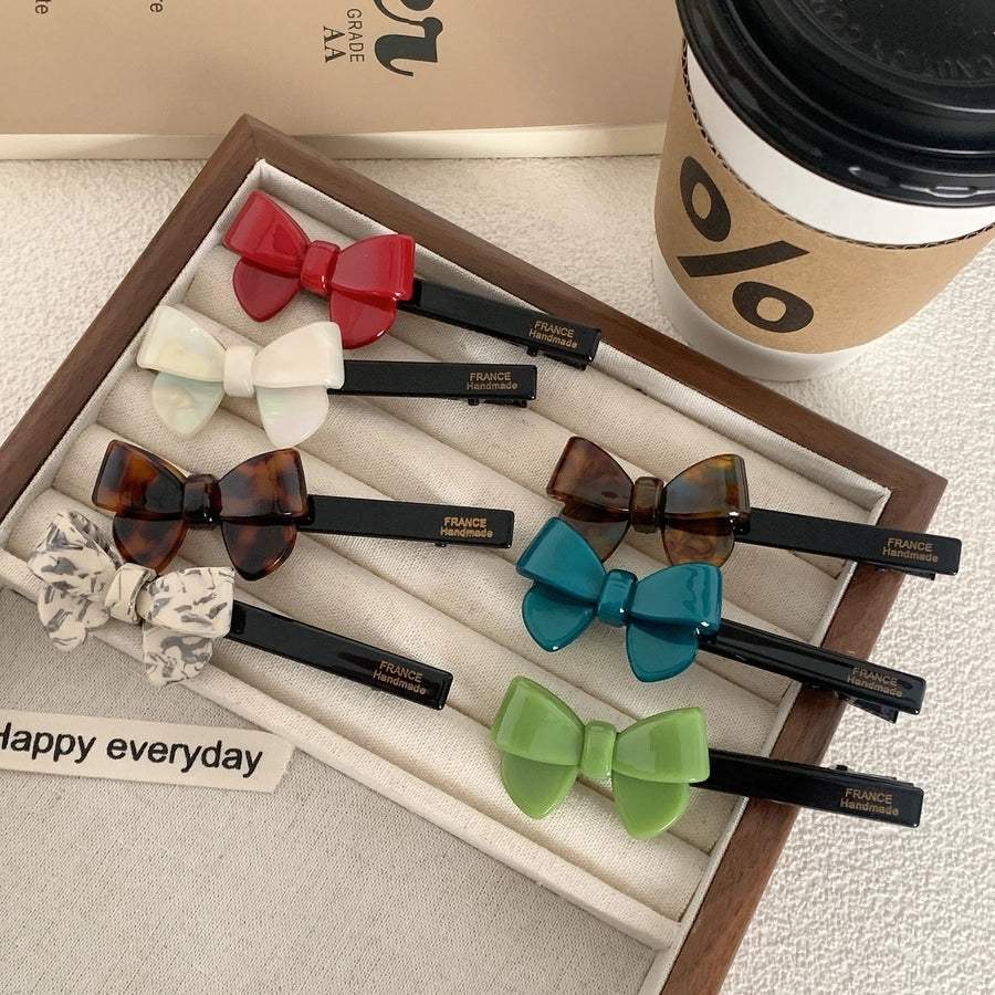 simple style bow knot acetic acid sheets hair clip