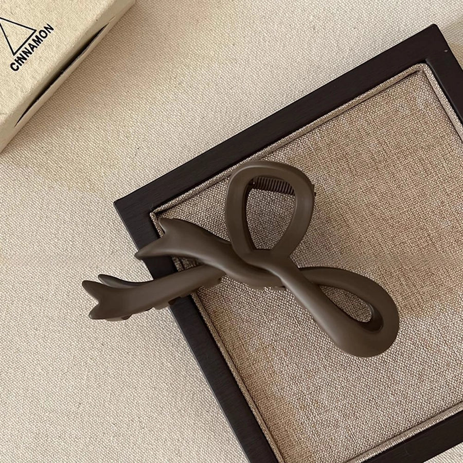 Women's Simple Style Bow Knot Arylic Hollow Out Hair Claws