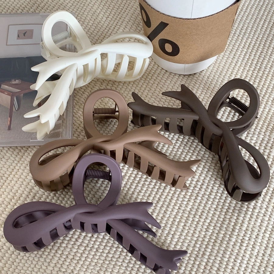 simple style bow knot plastic hair claws