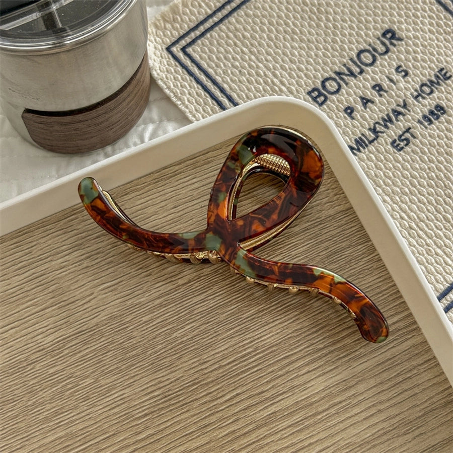 Women's Simple Style Waves Acetic acid sheets Metal Hair Claws