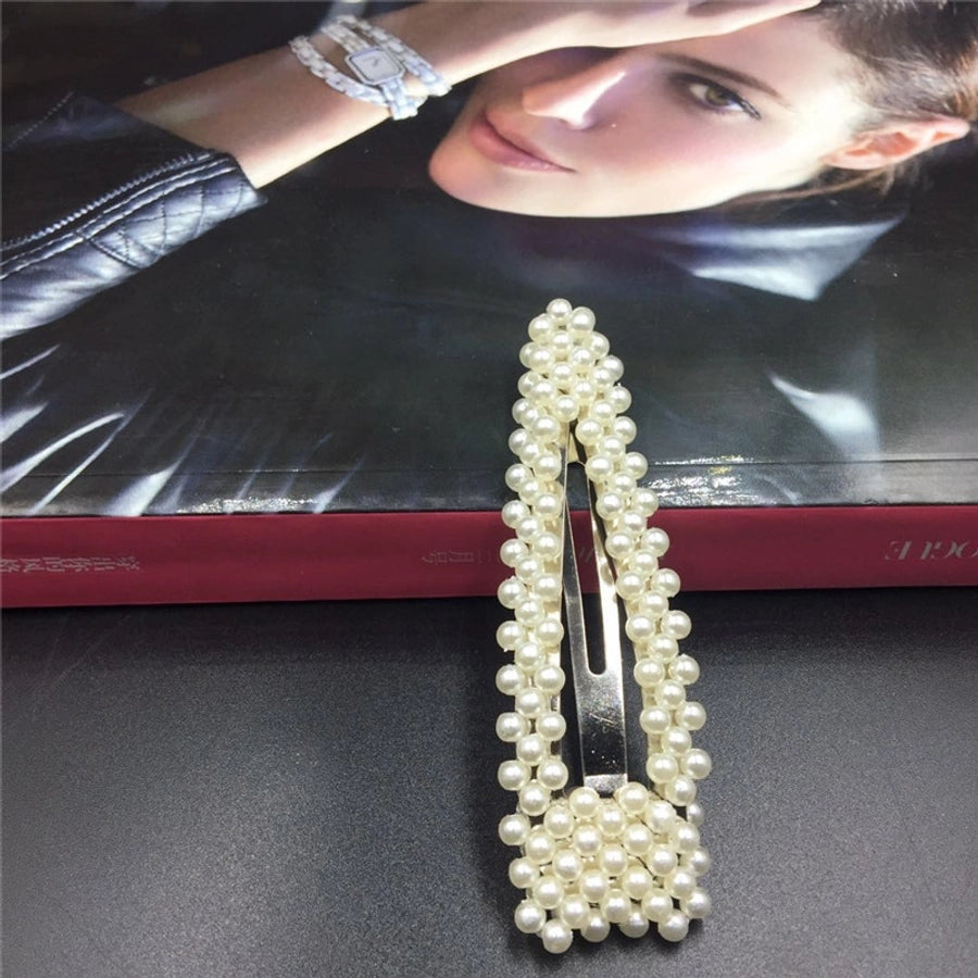 simple style geometric bow knot imitation pearl alloy plastic hair clip 1 piece