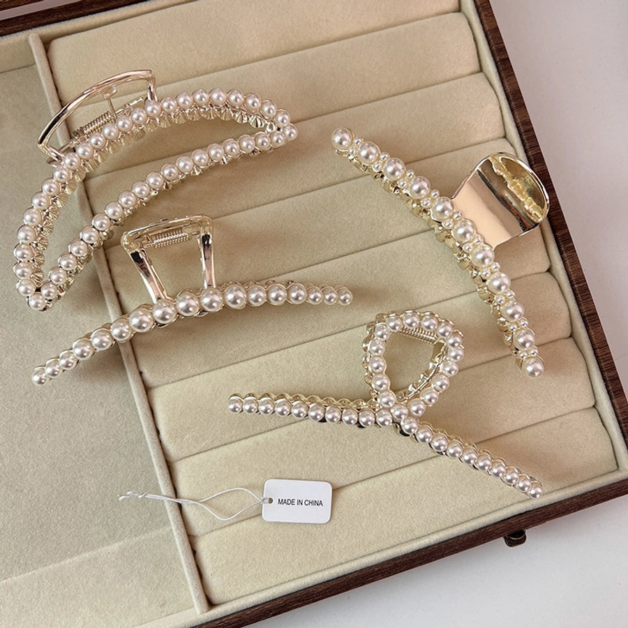 elegant geometric alloy inlay artificial pearls hair claws