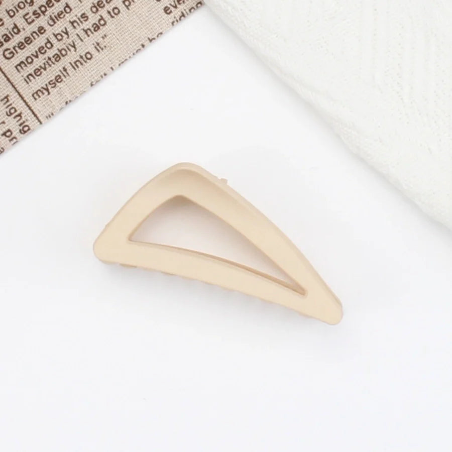 women's simple style triangle plastic hair claws