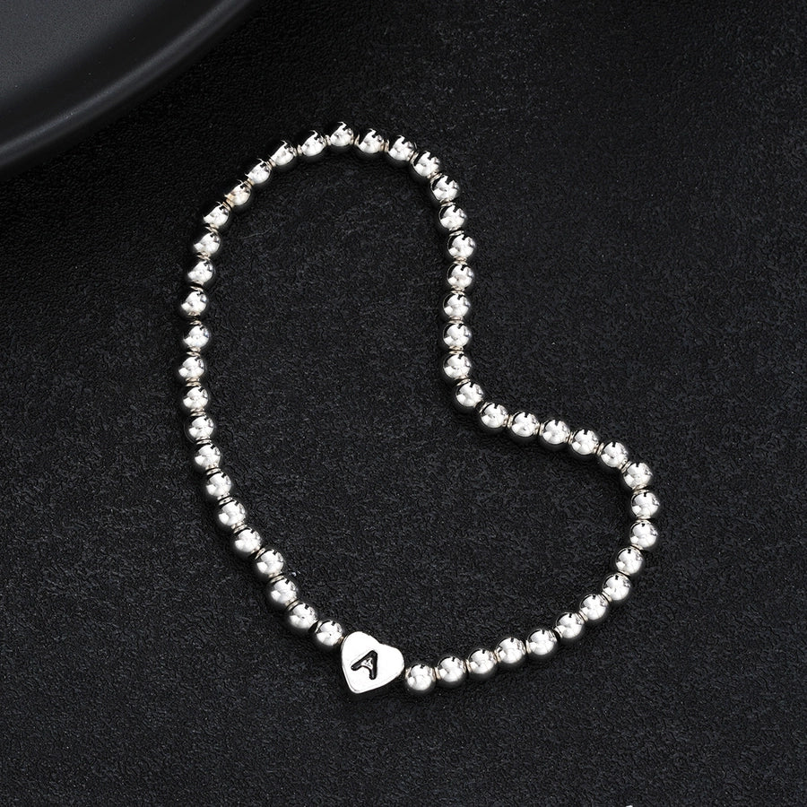 Europe and America Cross Border Hot Sale Creative 26 Letters round Beads Heart-Shaped Copper Bracelet Fashion Ins Simple Beaded Elastic Bracelet