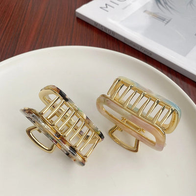 women's simple style solid color alloy plating hair claws