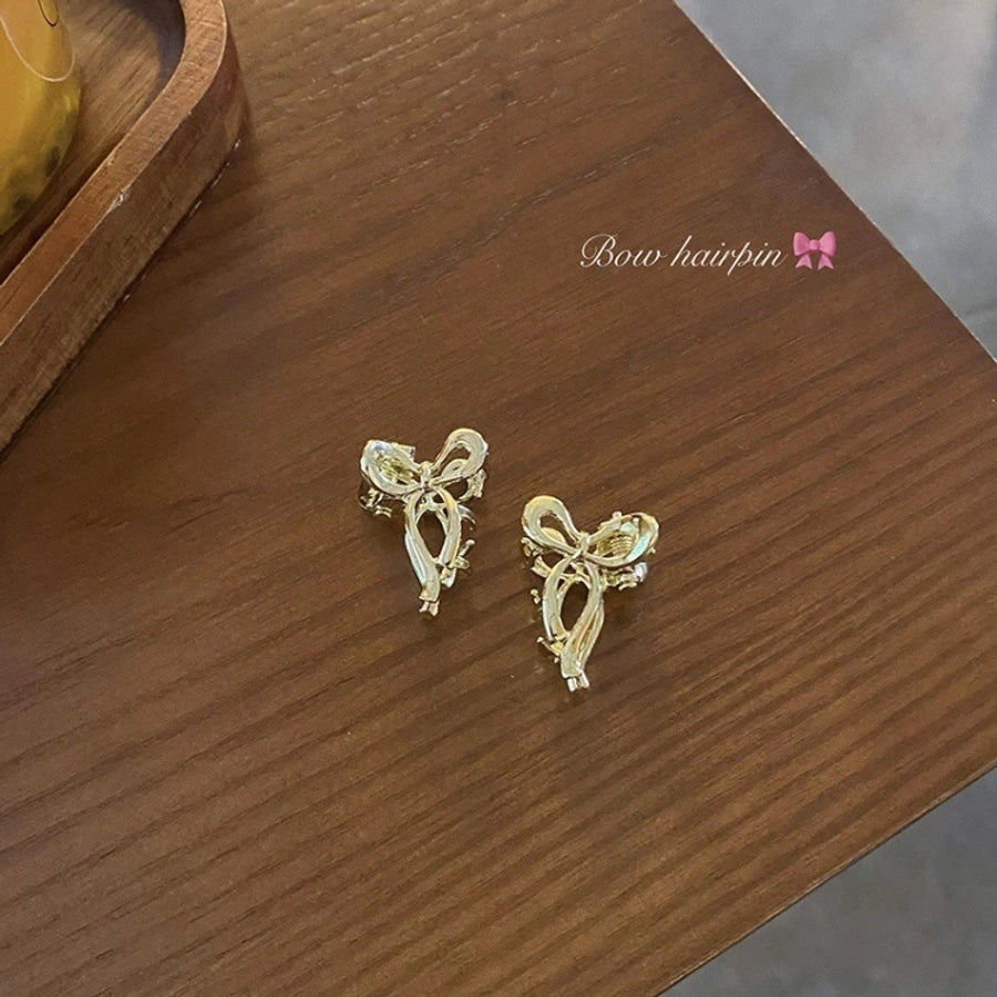 Go to windy places Liu Yifei Xu Hongdou with the same bow small grip Princess head metal bangs hairpin female