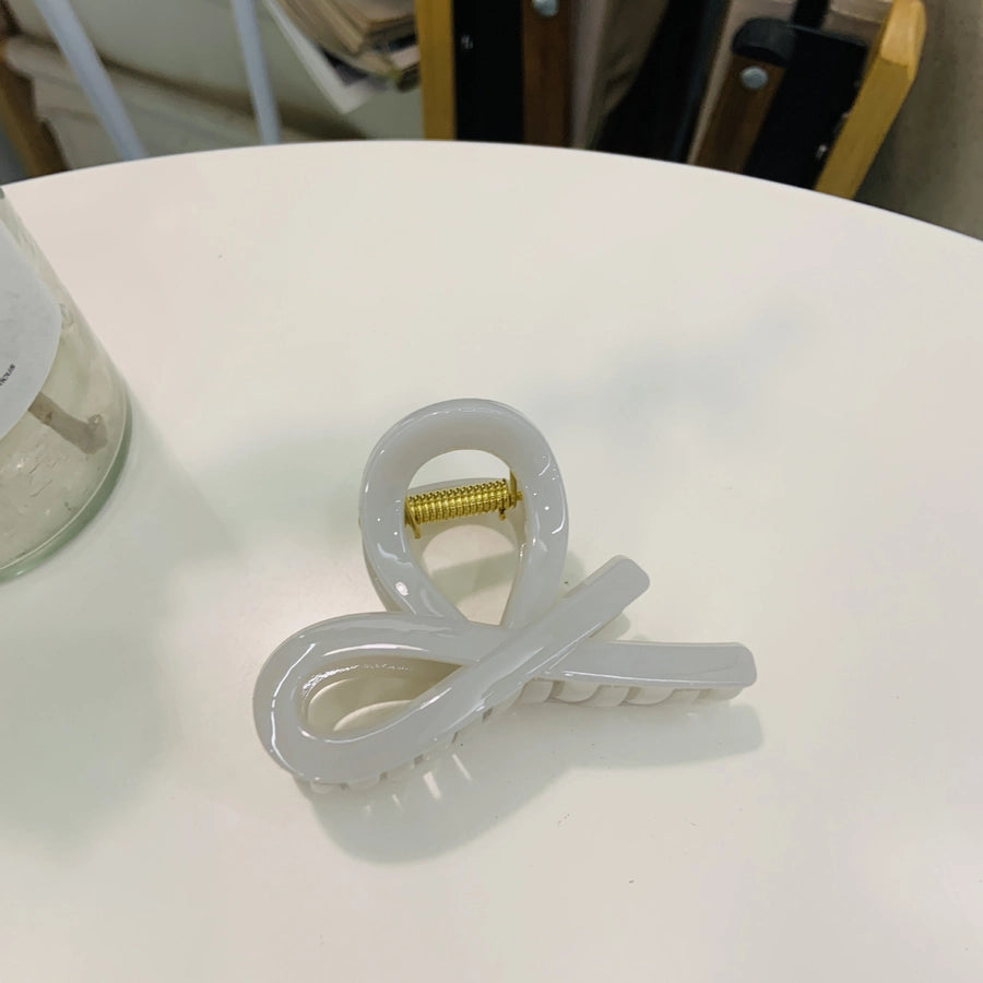 Women's Simple Style Bow Knot Plastic Resin Polishing Hair Claws