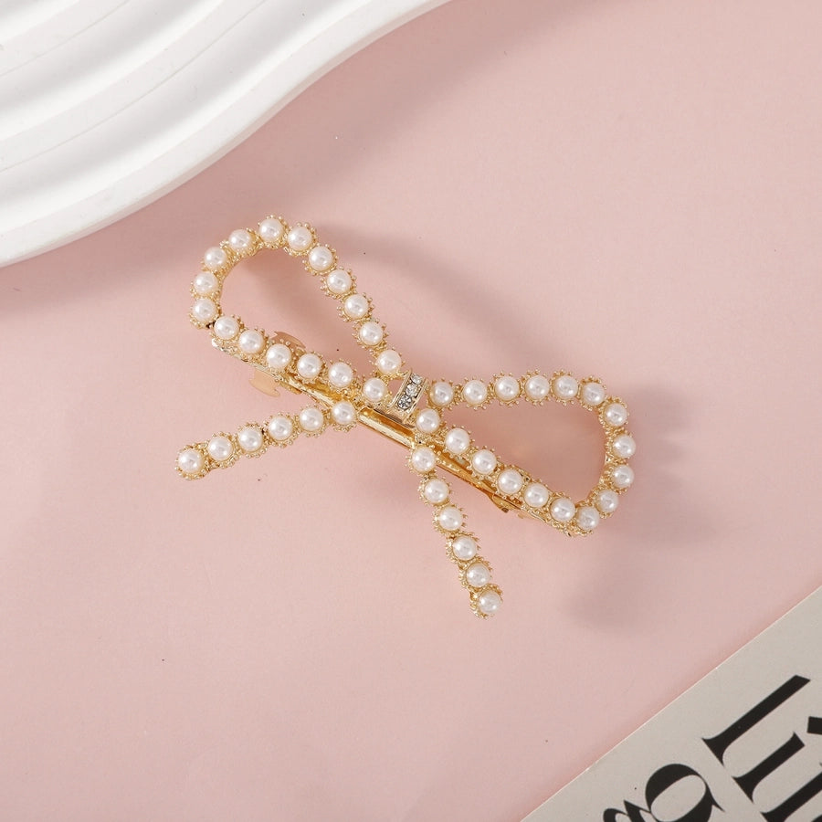 Women's Simple Style Geometric Bow Knot Alloy Plating Hair Clip