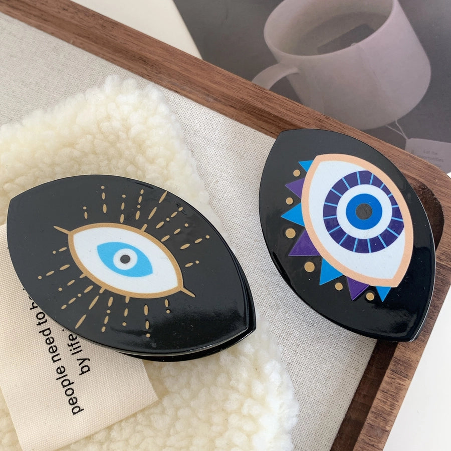 exaggerated funny devil's eye acetic acid sheets hair claws