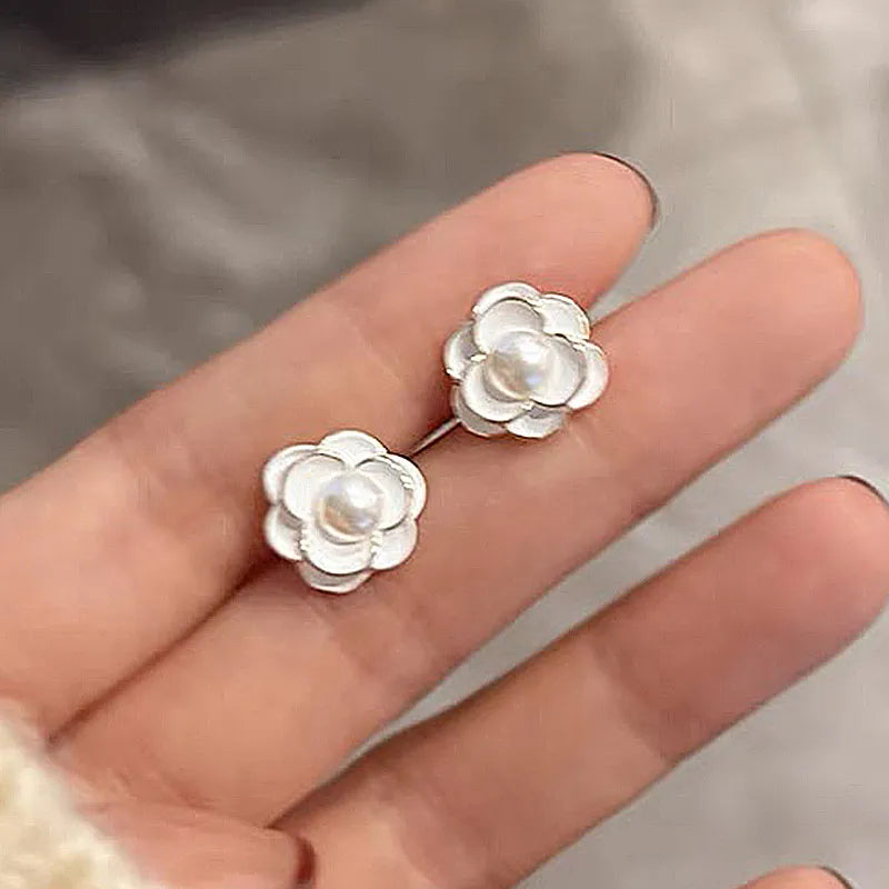 1 pair elegant simple style streetwear flower bow knot plating inlay alloy artificial pearls zircon ear studs