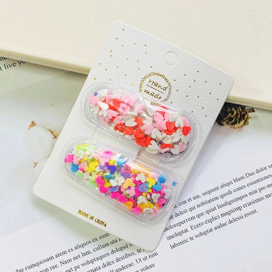 cartoon style heart shape flower plastic hair clip