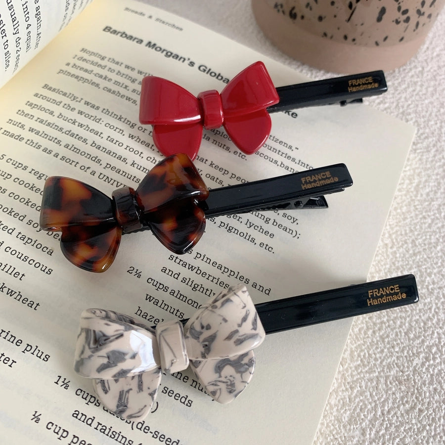 simple style bow knot acetic acid sheets hair clip