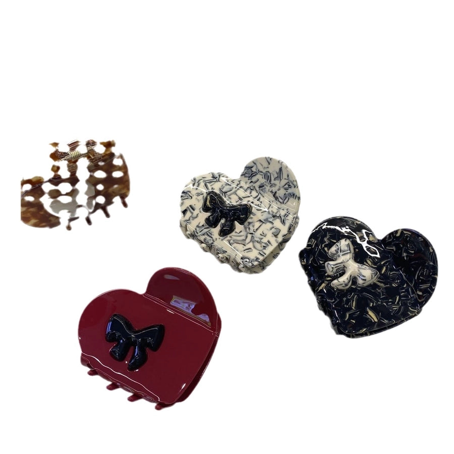 Women's Simple Style Heart Shape Bow Knot Acetic acid sheets Hair Claws