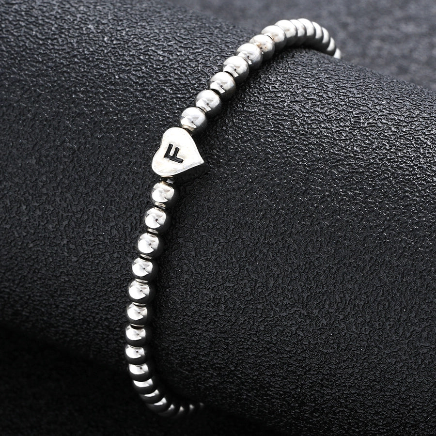 Europe and America Cross Border Hot Sale Creative 26 Letters round Beads Heart-Shaped Copper Bracelet Fashion Ins Simple Beaded Elastic Bracelet