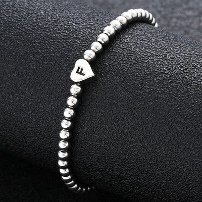 Europe and America Cross Border Hot Sale Creative 26 Letters round Beads Heart-Shaped Copper Bracelet Fashion Ins Simple Beaded Elastic Bracelet