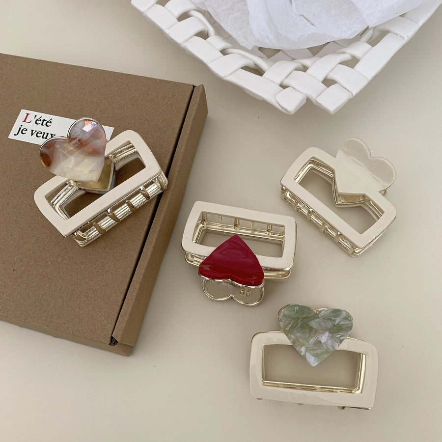 Women's Simple Style Classic Style Heart Shape Acetic acid sheets Hair Claws