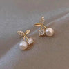 1 pair elegant simple style streetwear flower bow knot plating inlay alloy artificial pearls zircon ear studs
