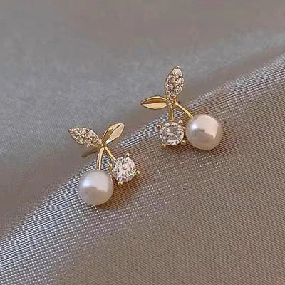 1 pair elegant simple style streetwear flower bow knot plating inlay alloy artificial pearls zircon ear studs