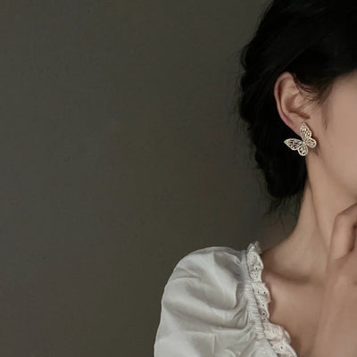 Light luxury high-grade butterfly mosquito coil ear clip without pierced women's super flash Mori style fresh earrings summer fashion