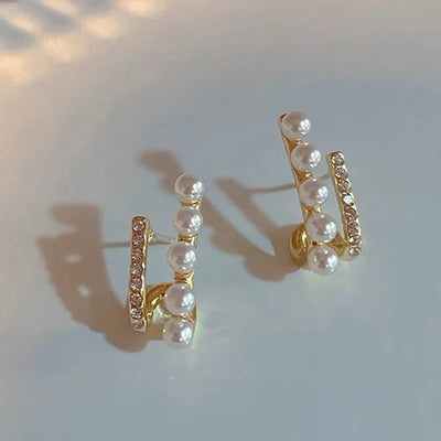 1 pair elegant simple style streetwear flower bow knot plating inlay alloy artificial pearls zircon ear studs
