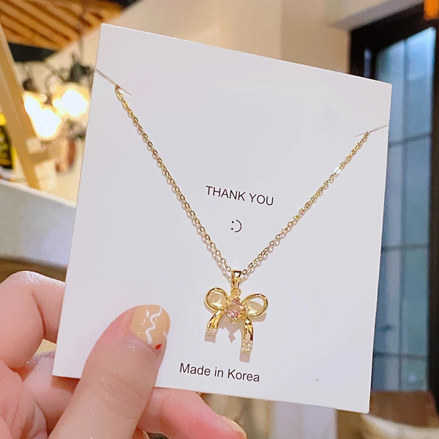 304 Stainless Steel Copper 18K Gold Plated K Gold Plated Inlay Bow Knot Zircon Pendant Necklace