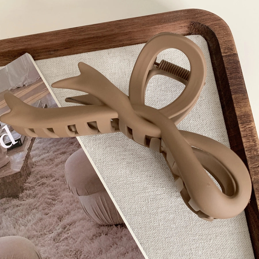 simple style bow knot plastic hair claws