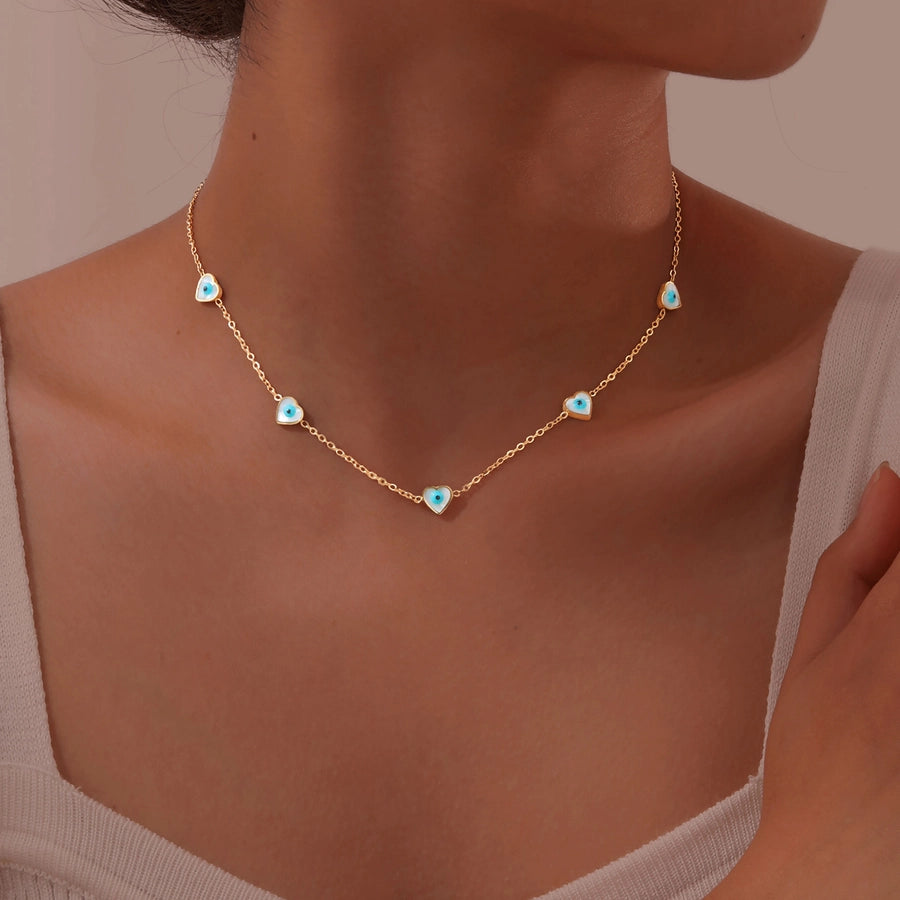 Jewelry Vintage Style Simple Style Heart Shape Eye Flower 201 Stainless Steel Necklace