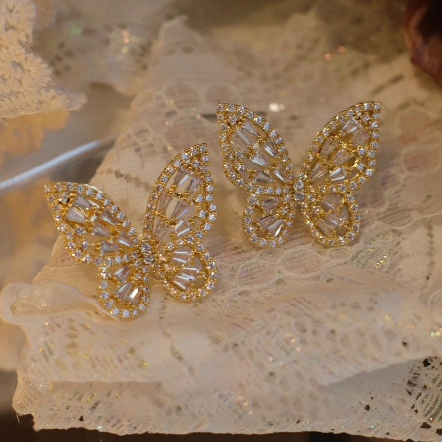 Light luxury high-grade butterfly mosquito coil ear clip without pierced women's super flash Mori style fresh earrings summer fashion