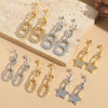1 Pair Elegant Retro Pentagram Oval Plating Inlay Copper Zircon 14K Gold Plated Drop Earrings