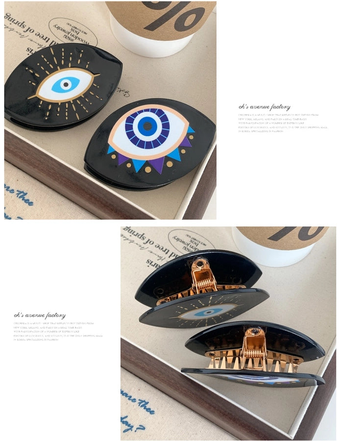 exaggerated funny devil's eye acetic acid sheets hair claws