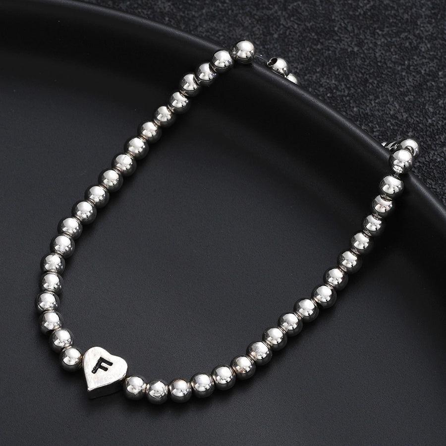Europe and America Cross Border Hot Sale Creative 26 Letters round Beads Heart-Shaped Copper Bracelet Fashion Ins Simple Beaded Elastic Bracelet
