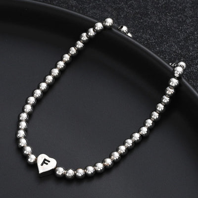 Europe and America Cross Border Hot Sale Creative 26 Letters round Beads Heart-Shaped Copper Bracelet Fashion Ins Simple Beaded Elastic Bracelet