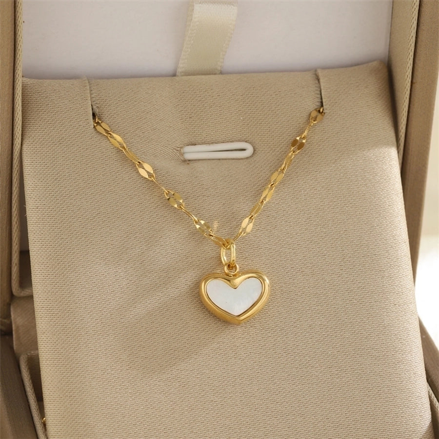 Jewelry Simple Style Classic Style Sun Heart Shape Bow Knot 201 Stainless Steel 304 Stainless Steel Rhinestones Shell Zircon 18K Gold Plated Inlay Pendant Necklace
