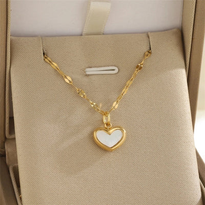 Jewelry Simple Style Classic Style Sun Heart Shape Bow Knot 201 Stainless Steel 304 Stainless Steel Rhinestones Shell Zircon 18K Gold Plated Inlay Pendant Necklace
