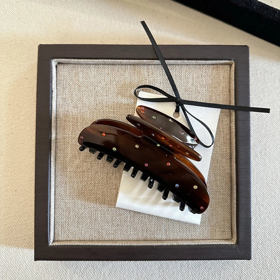 Women's Simple Style Geometric Acetic acid sheets Hair Claws