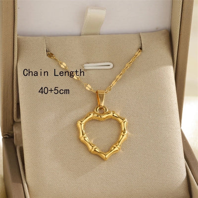 Jewelry Simple Style Classic Style Sun Heart Shape Bow Knot 201 Stainless Steel 304 Stainless Steel Rhinestones Shell Zircon 18K Gold Plated Inlay Pendant Necklace