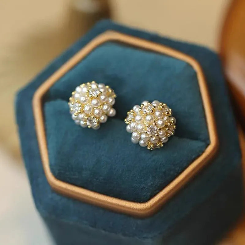 1 pair elegant simple style streetwear flower bow knot plating inlay alloy artificial pearls zircon ear studs