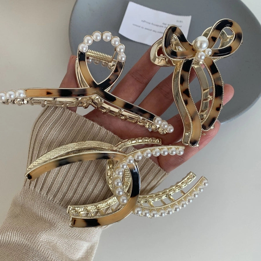 elegant geometric metal inlay artificial pearls hair claws