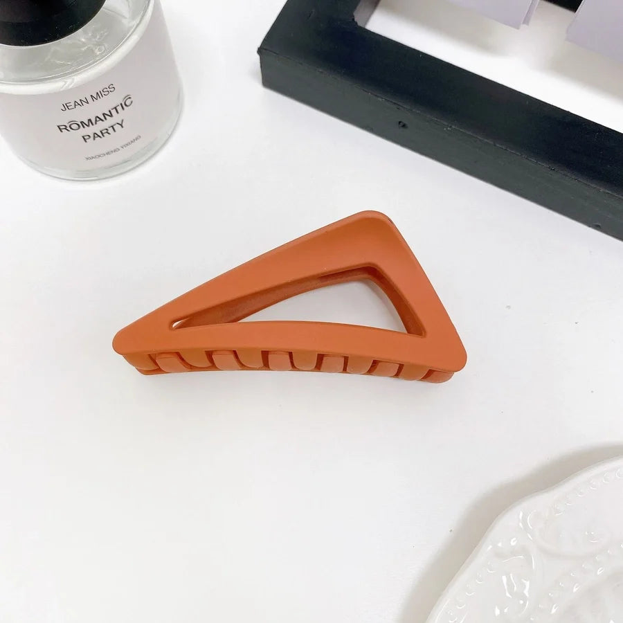 women's simple style triangle plastic hair claws