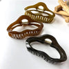 simple style irregular solid color plastic resin hollow out hair claws