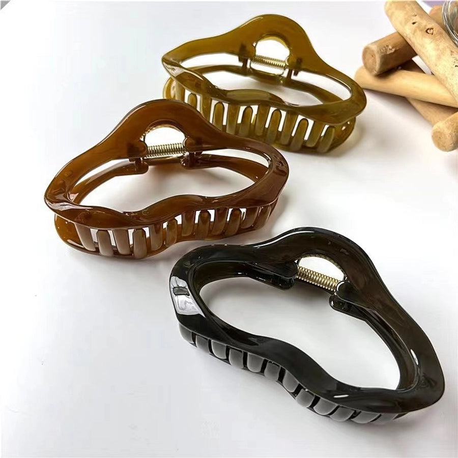 simple style irregular solid color plastic resin hollow out hair claws