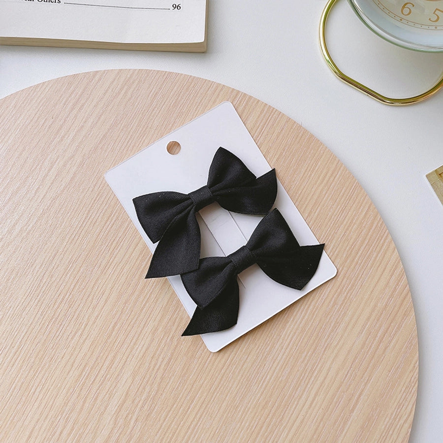 Girl'S Simple Style Classic Style Bow Knot Cloth Braid Hair Clip