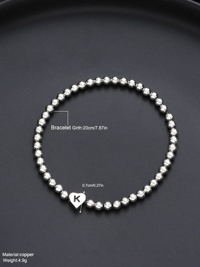 Europe and America Cross Border Hot Sale Creative 26 Letters round Beads Heart-Shaped Copper Bracelet Fashion Ins Simple Beaded Elastic Bracelet