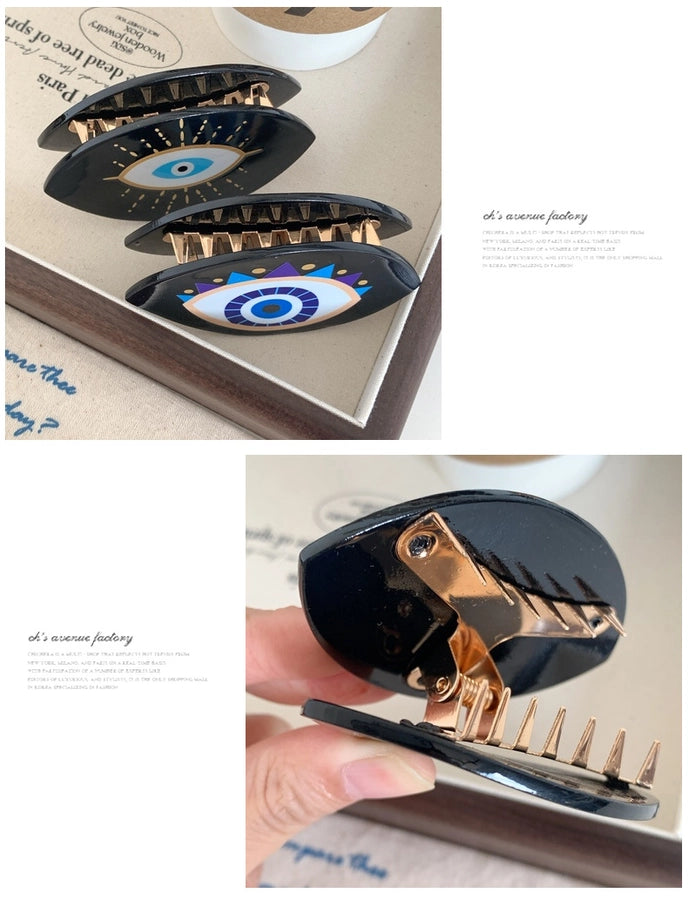 exaggerated funny devil's eye acetic acid sheets hair claws