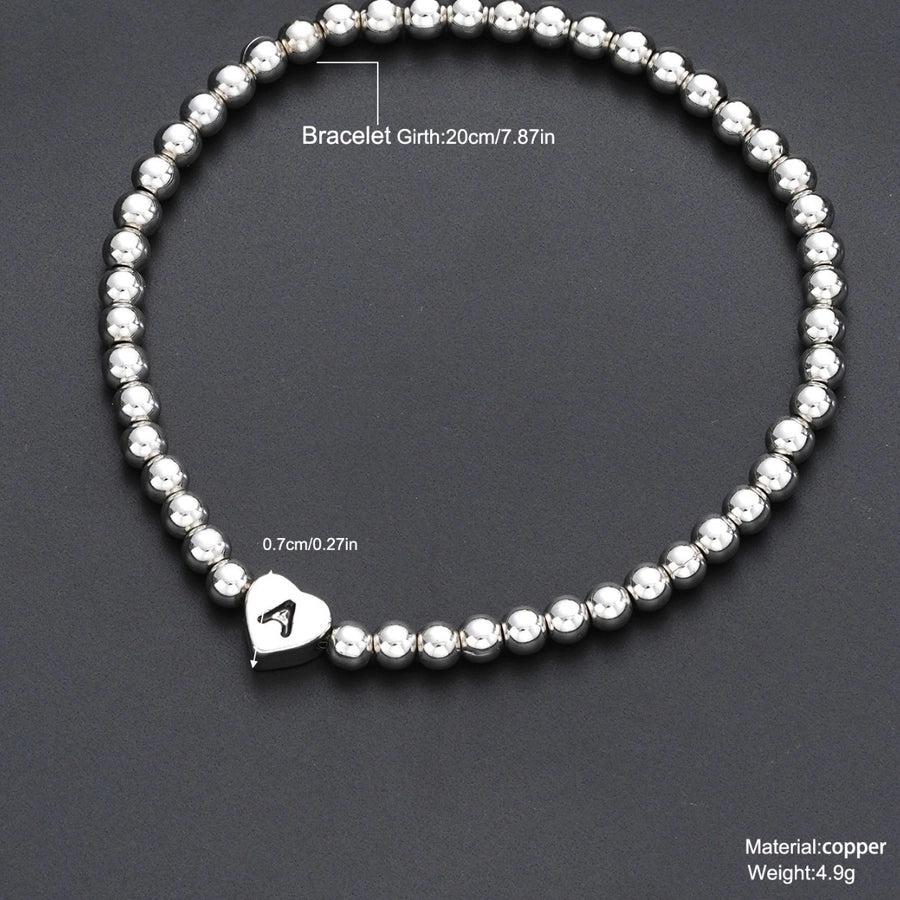 Europe and America Cross Border Hot Sale Creative 26 Letters round Beads Heart-Shaped Copper Bracelet Fashion Ins Simple Beaded Elastic Bracelet